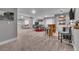 A finished basement with a recreation area, bar, and comfortable seating, perfect for relaxing at 18647 E Berry Dr, Aurora, CO 80015