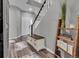 Inviting entryway with stylish decor and a staircase, creating a warm welcome at 18647 E Berry Dr, Aurora, CO 80015