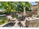 Outdoor patio with comfortable seating and a fire pit at 18647 E Berry Dr, Aurora, CO 80015