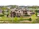 Beautiful home with a deck, a large yard, and a backyard at 2466 Spruce Meadows Dr, Broomfield, CO 80023