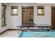 Ping pong and pool table with built-in storage in this game room at 2466 Spruce Meadows Dr, Broomfield, CO 80023