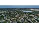 Beautiful aerial view of the neighborhood, surrounded by a lake and mature landscaping at 601 E 131St Ct, Thornton, CO 80241