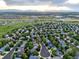 Lovely aerial view of property showcasing the home, mature trees and surrounding community at 601 E 131St Ct, Thornton, CO 80241