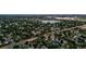 Amazing aerial view of the neighborhood, surrounded by mature landscaping and a lake at 601 E 131St Ct, Thornton, CO 80241
