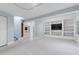 Finished basement featuring built-in shelving and a cozy atmosphere, suitable for entertainment and relaxation at 601 E 131St Ct, Thornton, CO 80241