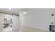 Basement area with whiteboard, desk, and sliding barn door offers flexible space for work or hobbies at 601 E 131St Ct, Thornton, CO 80241
