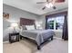 Comfortable bedroom with a decorative headboard, ample natural light, and cozy carpeting at 601 E 131St Ct, Thornton, CO 80241