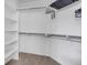 Walk-in closet with shelving and hanging rods for organized storage solutions at 601 E 131St Ct, Thornton, CO 80241