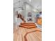Grand entryway with hardwood floors, staircase, and architectural details at 601 E 131St Ct, Thornton, CO 80241