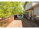 Spacious outdoor deck with seating and a grill, ideal for entertaining and enjoying the outdoors at 3935 Pierson St, Wheat Ridge, CO 80033