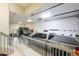 Spacious garage with high ceilings, storage solutions, and ample room for vehicles at 3935 Pierson St, Wheat Ridge, CO 80033
