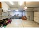 Large, well-lit garage with multiple parking spaces and storage, ideal for car enthusiasts at 3935 Pierson St, Wheat Ridge, CO 80033