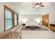 Serene main bedroom retreat with vaulted ceiling, sitting area, and neutral decor at 3935 Pierson St, Wheat Ridge, CO 80033