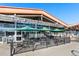 Charming bakery entrance featuring outdoor seating with umbrellas and a welcoming storefront at 1279 Leyden St, Denver, CO 80220