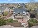 Enjoy the private backyard with a covered patio, a fire pit, and a tranquil water feature at 1457 Rosedale St, Castle Rock, CO 80104