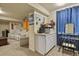 Basement area featuring extra storage with cabinets, countertop and desk setup at 1457 Rosedale St, Castle Rock, CO 80104