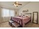Relaxing primary bedroom featuring a plush bed and natural light at 1457 Rosedale St, Castle Rock, CO 80104