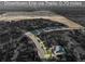 An aerial view shows the short distance from the property to Downtown Erie via trails at 515 Orion Ave, Erie, CO 80516