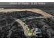 An aerial view shows the easy access to miles of nature trails from this property at 515 Orion Ave, Erie, CO 80516
