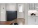 Clean entryway and view into the kitchen at 515 Orion Ave, Erie, CO 80516