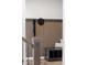 Stylish entryway with a wood slat wall, hooks, and a convenient storage bench at 515 Orion Ave, Erie, CO 80516