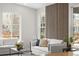 Bright living room showcasing modern wall decor and a comfortable seating area at 515 Orion Ave, Erie, CO 80516