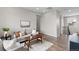 Cozy living room featuring a comfortable seating arrangement and contemporary decor at 515 Orion Ave, Erie, CO 80516