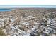 Aerial view of neighborhood showcasing a home in winter at 10665 W 79Th Pl, Arvada, CO 80005