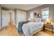 Main bedroom features hardwood floors, neutral paint colors and closet at 1060 Grove St, Denver, CO 80204