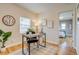 Office with a modern desk, chair, rug, and natural light at 1060 Grove St, Denver, CO 80204