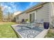 Charming patio with an outdoor grill, seating, and rug, ideal for entertaining and relaxation at 19691 E 59Th Dr, Aurora, CO 80019