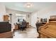 Home office with built-in desk and shelving, offering a quiet workspace at 2473 S Carr Ct, Lakewood, CO 80227