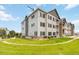 Beautiful multi-story apartment complex with manicured lawns and inviting architecture at 15700 E Jamison Dr # 305, Englewood, CO 80112