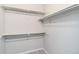 Walk-in closet with ample shelving and plenty of room for your clothes and belongings at 15700 E Jamison Dr # 305, Englewood, CO 80112
