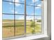 A clear view from the window overlooks rolling hills and neighborhood homes at 15700 E Jamison Dr # 305, Englewood, CO 80112