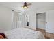 Well-lit bedroom with hardwood floors and a closet at 2711 S Fenton St, Denver, CO 80227
