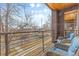 Charming balcony view with seating and wrought iron railing overlooking the street at 3207 W 25Th Ave, Denver, CO 80211