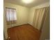 Bedroom featuring hardwood floors and neutral colored walls at 701 S Pecos St, Denver, CO 80223