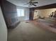 Cozy living room with a brick fireplace and carpet flooring at 701 S Pecos St, Denver, CO 80223