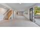 Spacious finished basement with walkout to pool featuring staircase and neutral carpet, perfect for entertaining at 92 S Devinney St, Golden, CO 80401