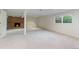 Finished basement features a charming brick fireplace and a window that lets in natural light at 92 S Devinney St, Golden, CO 80401
