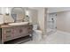 Modern bathroom with a vessel sink, a dark wood vanity, and tiled glass shower stall at 92 S Devinney St, Golden, CO 80401