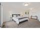 Bright main bedroom with two windows, carpet floors, neutral paint and modern lighting at 92 S Devinney St, Golden, CO 80401
