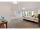 Spacious main bedroom with lots of natural light, neutral tones and an ensuite bathroom at 92 S Devinney St, Golden, CO 80401