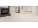 Finished basement featuring a fireplace and bar area at 8525 E 149Th Dr, Thornton, CO 80602