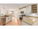 Bright kitchen featuring stainless steel appliances and a granite countertop with stylish light fixtures at 8525 E 149Th Dr, Thornton, CO 80602