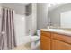 Bathroom featuring a shower-tub combo and single sink at 7130 Simms St # 206, Arvada, CO 80004