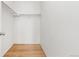 Walk-in closet with hardwood floors and a single rod at 7130 Simms St # 206, Arvada, CO 80004