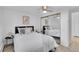 Cozy bedroom with large closet, ceiling fan, comfortable bed, and stylish decor at 2700 S Holly St # 107, Denver, CO 80222