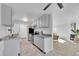 Charming kitchen featuring stainless steel appliances, granite countertops, and ample storage at 2700 S Holly St # 107, Denver, CO 80222